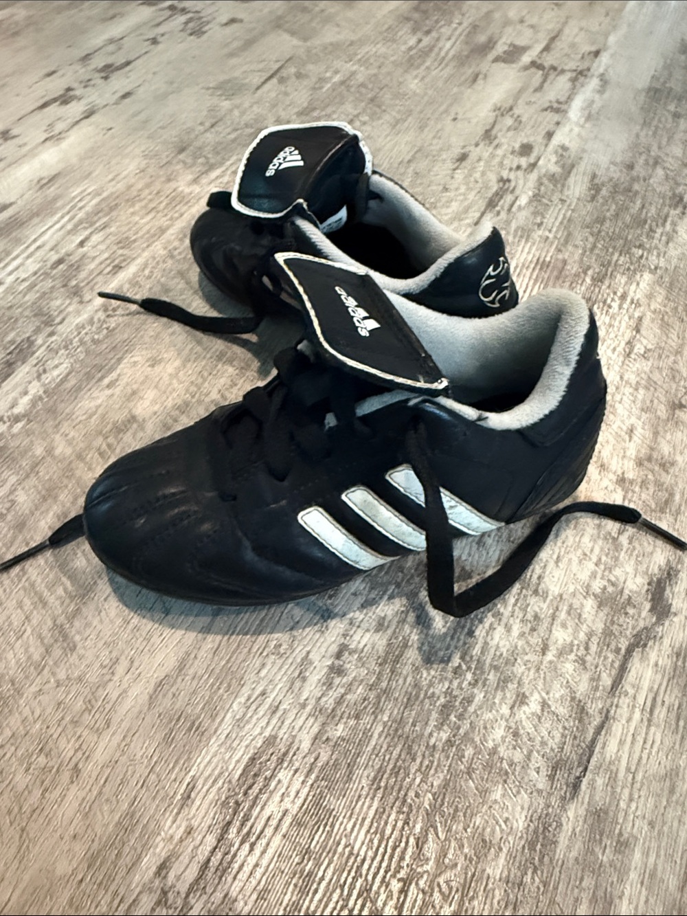 Adidas Black and White Cleats